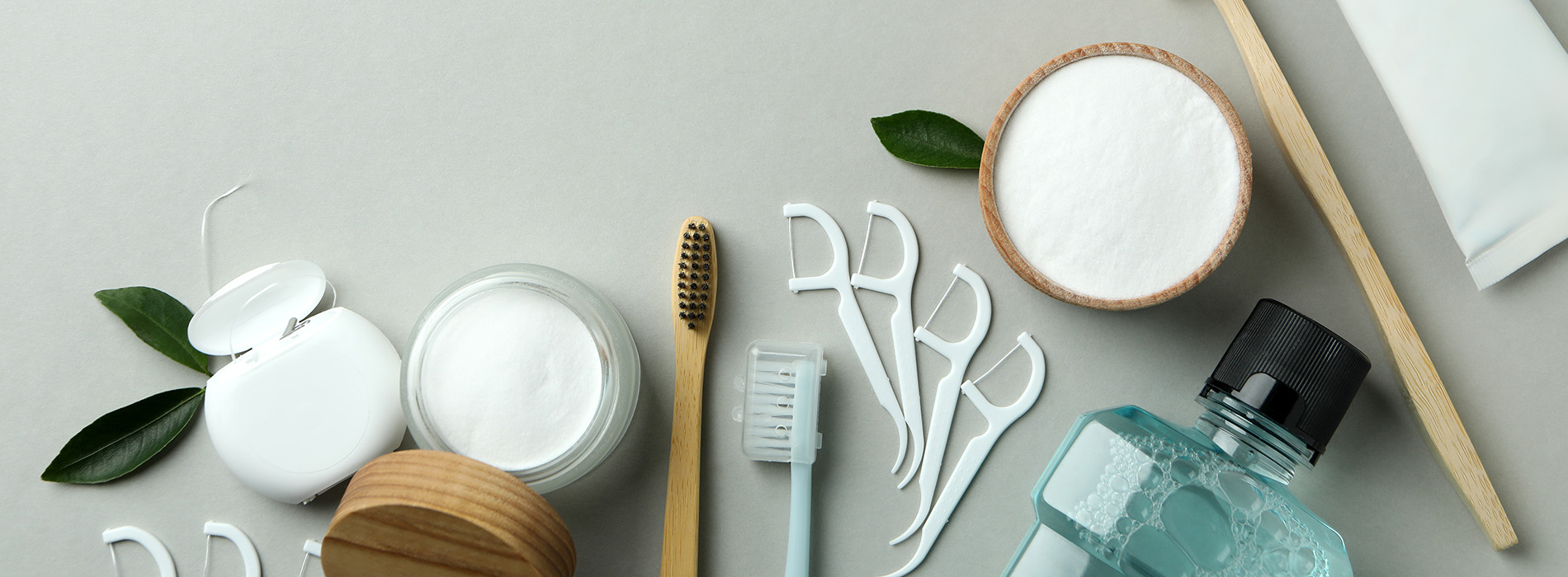 A collection of skincare products displayed on a table with a clean, minimalist aesthetic.